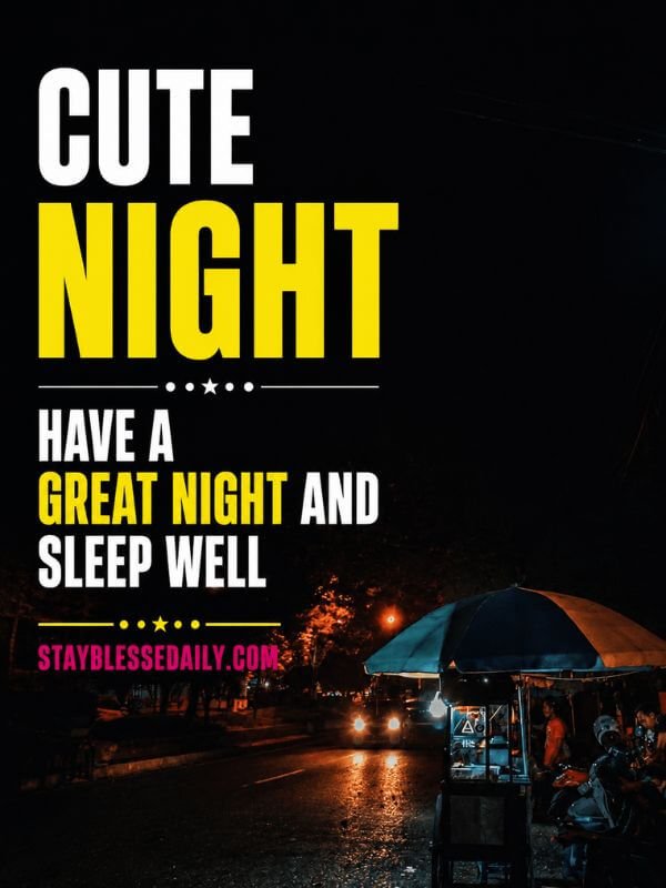 Cute Good Night Images and Gifs greeting with a rainy city street, glowing lights, colorful umbrella, and wishes to sleep well